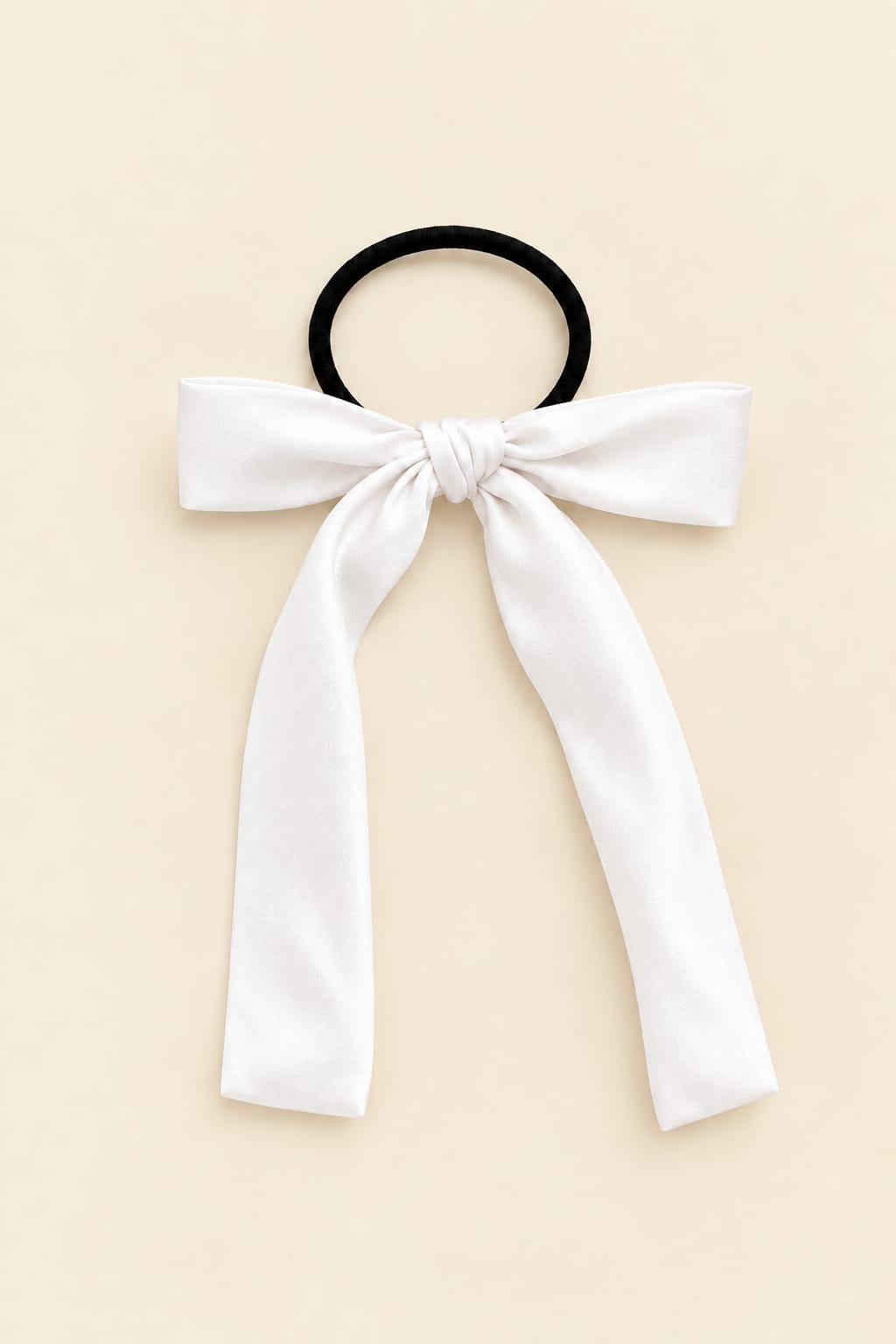 Long bow hair clip with large knot