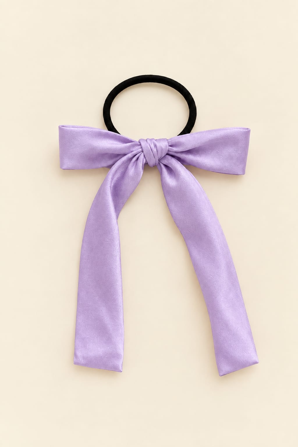 Long bow hair clip with large knot